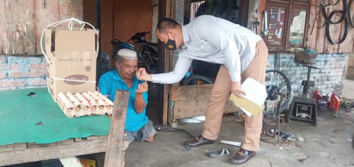 Satres Narkoba Salurkan Bansos Kapolres Labuhanbatu 