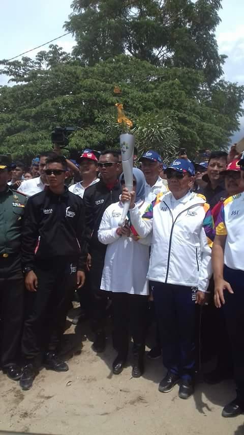 Wabub Tobasa Hulman Sitorus Sambut Obor Asian Games di Toba Samosir Lumban Bulbul
