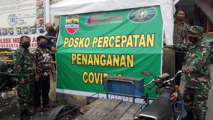 Ajak Warga Tetapkan Prokes, Satgas Covid-19 Kodim 0201/BS Koramil 04/ MK Dirikan Posko Percepatan Penanganan Covid Di Pasar Sukaramai
