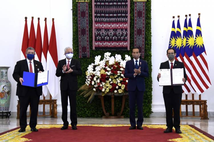 Bertemu PM Malaysia, Presiden Jokowi Dorong Penyelesaian MoU Perlindungan TKI dan Negosiasi Batas Negara